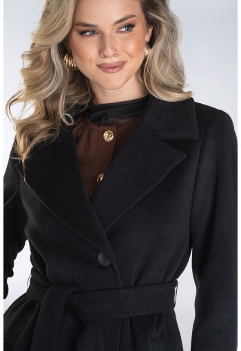 Jednorzędowy płaszcz damski z szerokimi klapami i krytym zapięciem – minimalistyczny, elegancki i doskonały do wielu stylizacji.