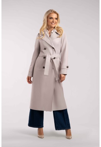 Długi płaszcz damski z lekkiej tkaniny idealny na wiosnę.
Elegancki fason, kobiecy krój z odpinanym paskiem.